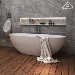 CASAINC 29.53-in X 64.96-in White Solid Surface Oval Center Drain Freestanding Bathtub